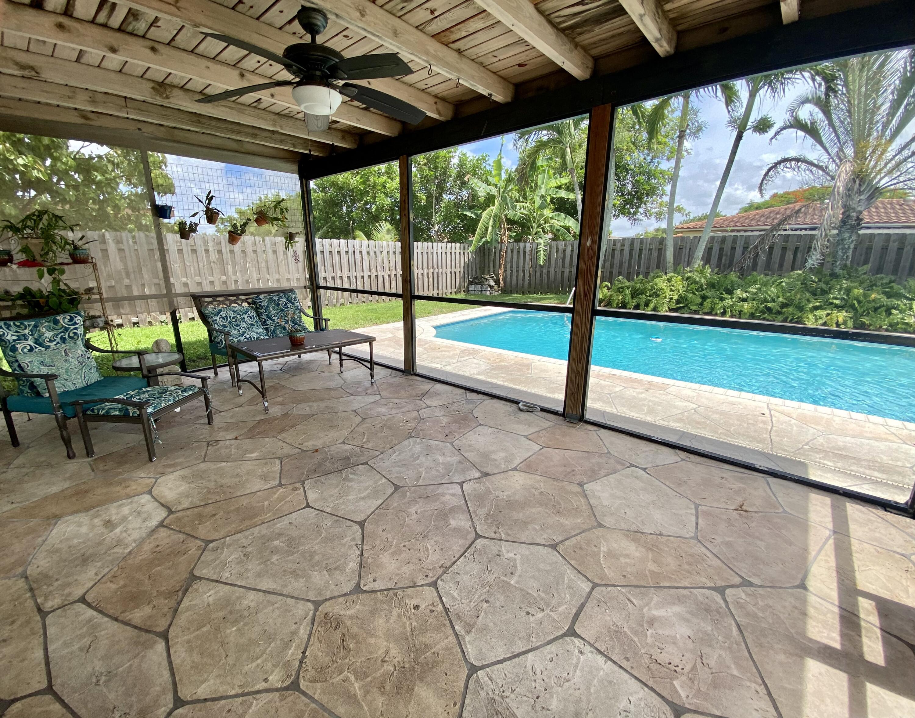 4730 Betelnut Street Boca Raton, FL 33428 - Photo 32 of 42 a view of porch with seating space