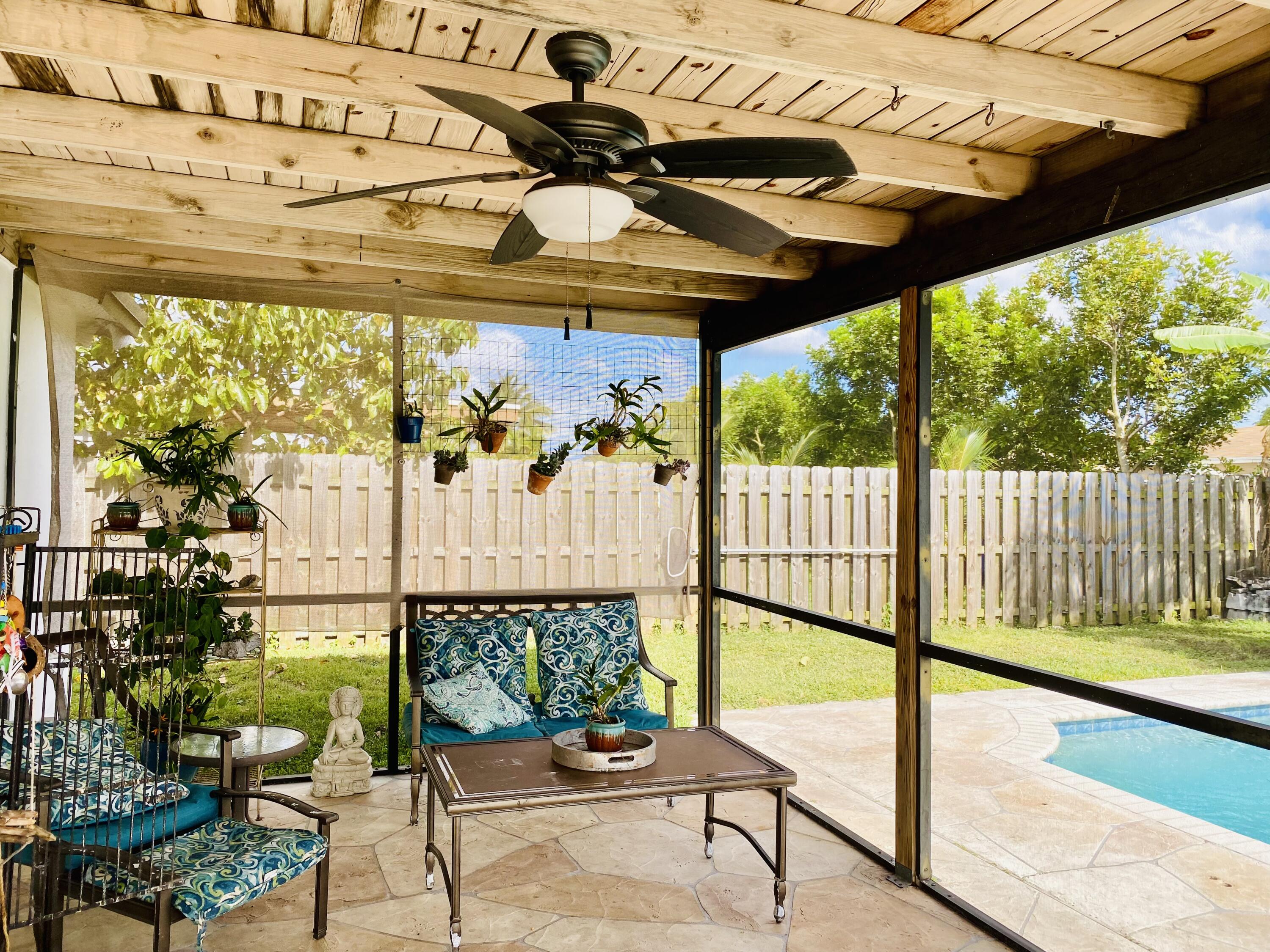 4730 Betelnut Street Boca Raton, FL 33428 - Photo 33 of 42 a building outdoor space with balcony