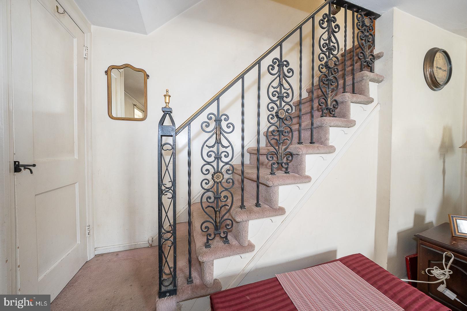 103 Margate Road Upper Darby, PA 19082 - Photo 4 of 20 Elegant staircase with ornate railing.