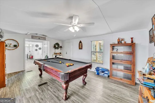 a view of a living room and dining room