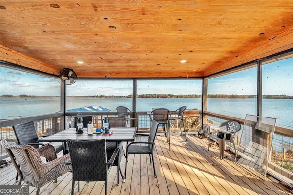 a view of a balcony dining area
