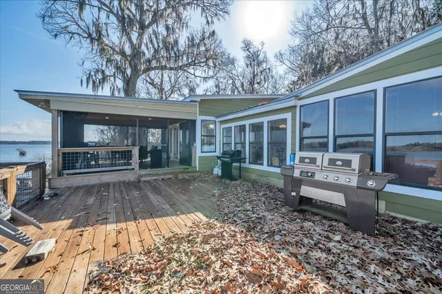 a front view of a house with a boat