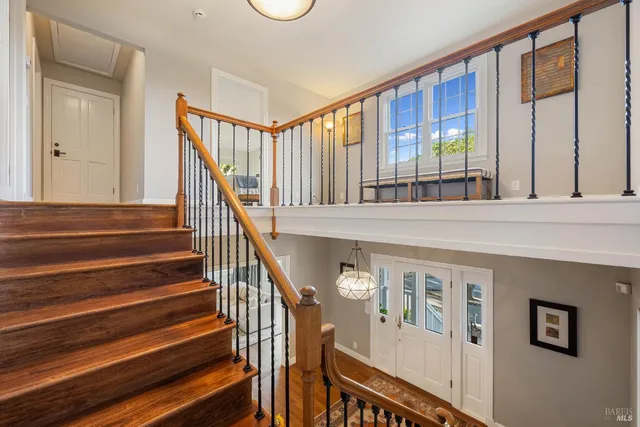 a bed room with a bed and a window