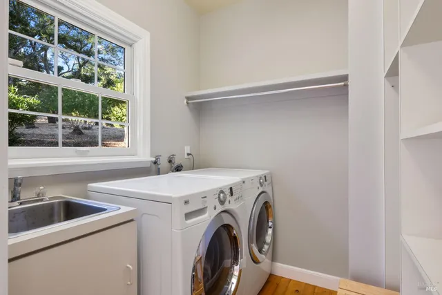 a view of a yard with a tree