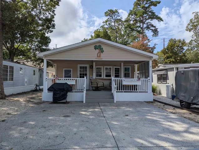 a front view of a house with a garage