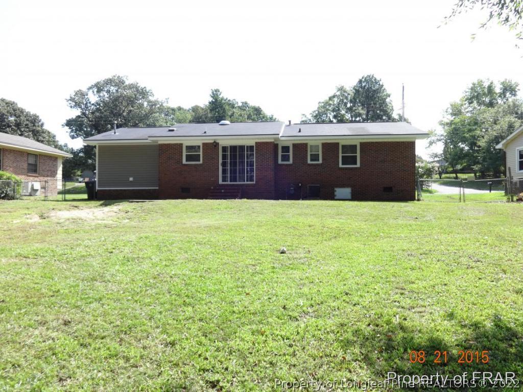 414 Lansdowne Road Fayetteville, NC 28314 - Photo 2 of 14 a house that has a big yard