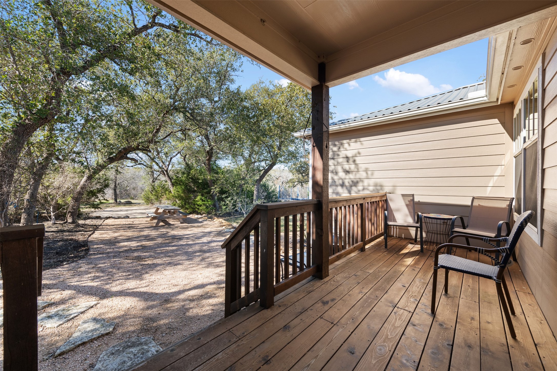 1610 Pace Bend Road North Spicewood, TX 78669 - Photo 12 of 32 a view of a two chairs in the balcony
