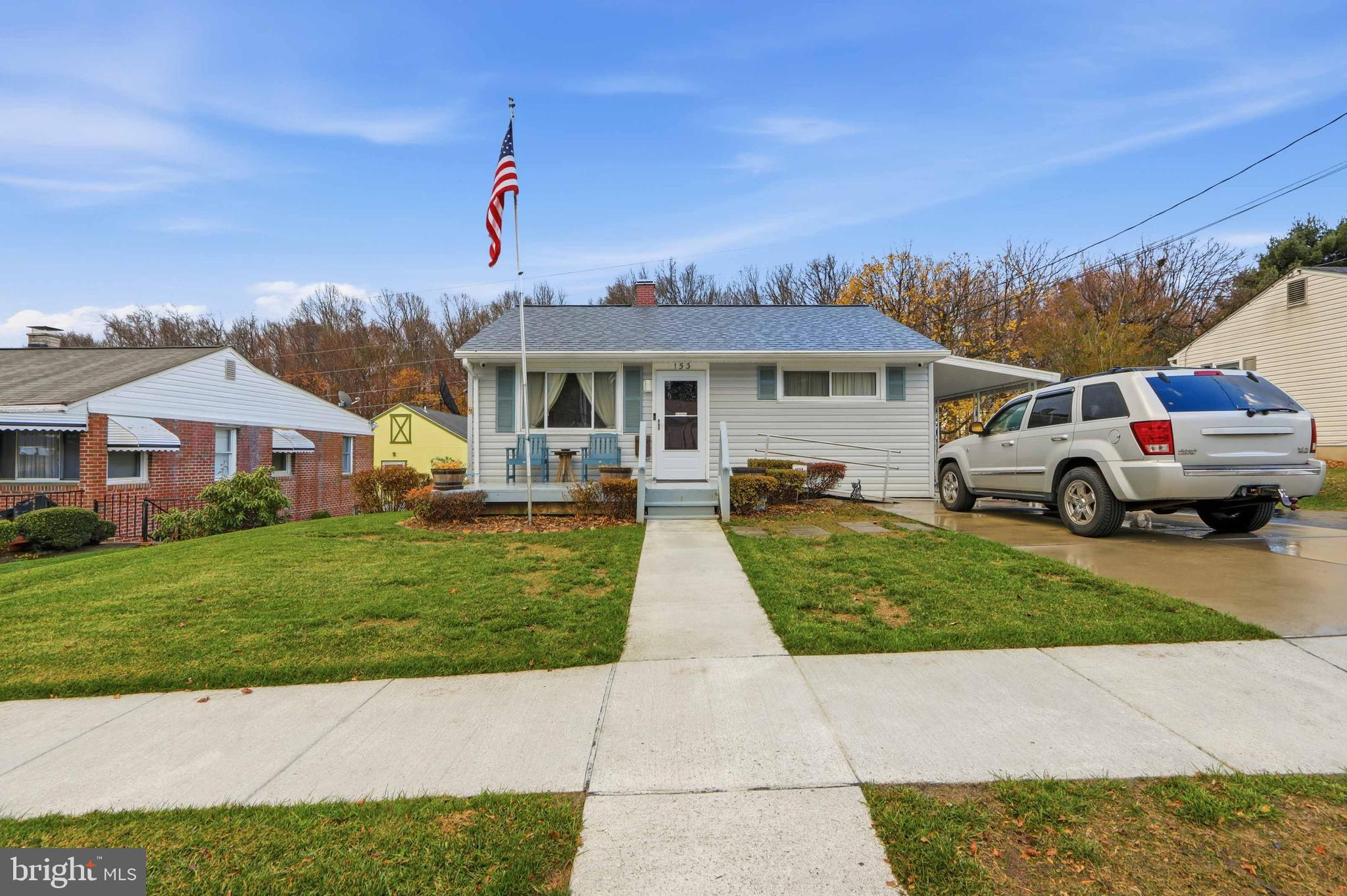 153 Wilgate Road Owings Mills, MD 21117 - Photo 1 of 22 a front view of a house with a yard