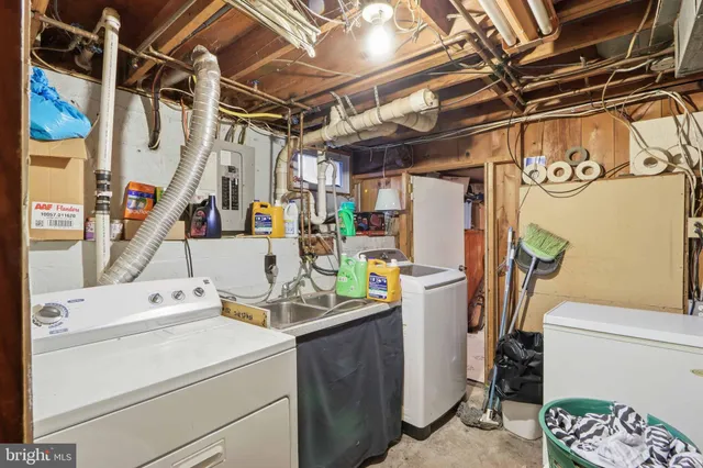 a utility room with dryer and washer