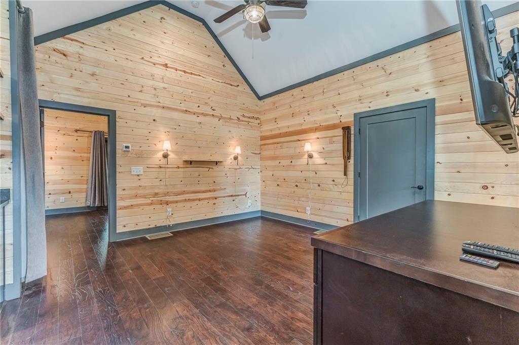 850 Bethel Church Road Southeast Silver Creek, GA 30173 - Photo 16 of 52 an empty room with wooden floor and windows