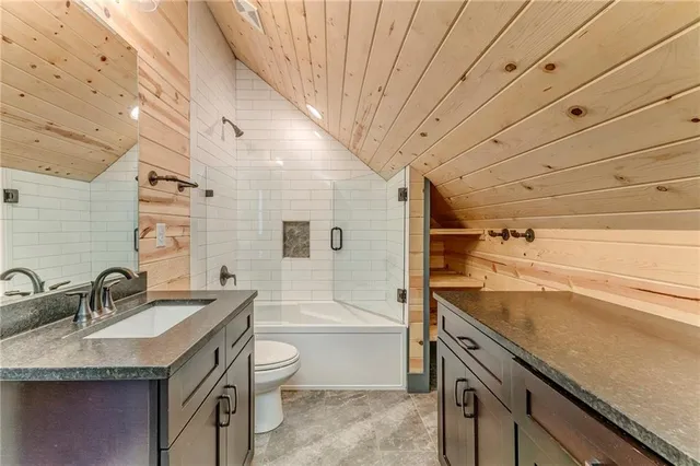 a kitchen with a stove and a sink