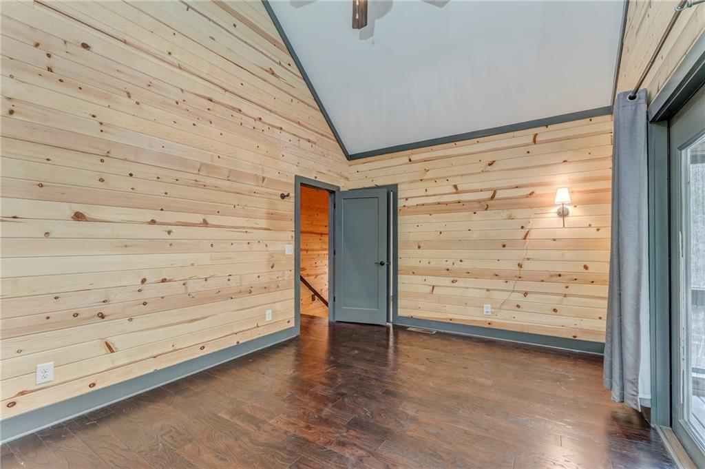 850 Bethel Church Road Southeast Silver Creek, GA 30173 - Photo 27 of 52 a view of an empty room and wooden floor and cabinet