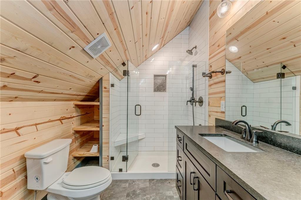 850 Bethel Church Road Southeast Silver Creek, GA 30173 - Photo 33 of 52 a bathroom with a sink a toilet and shower