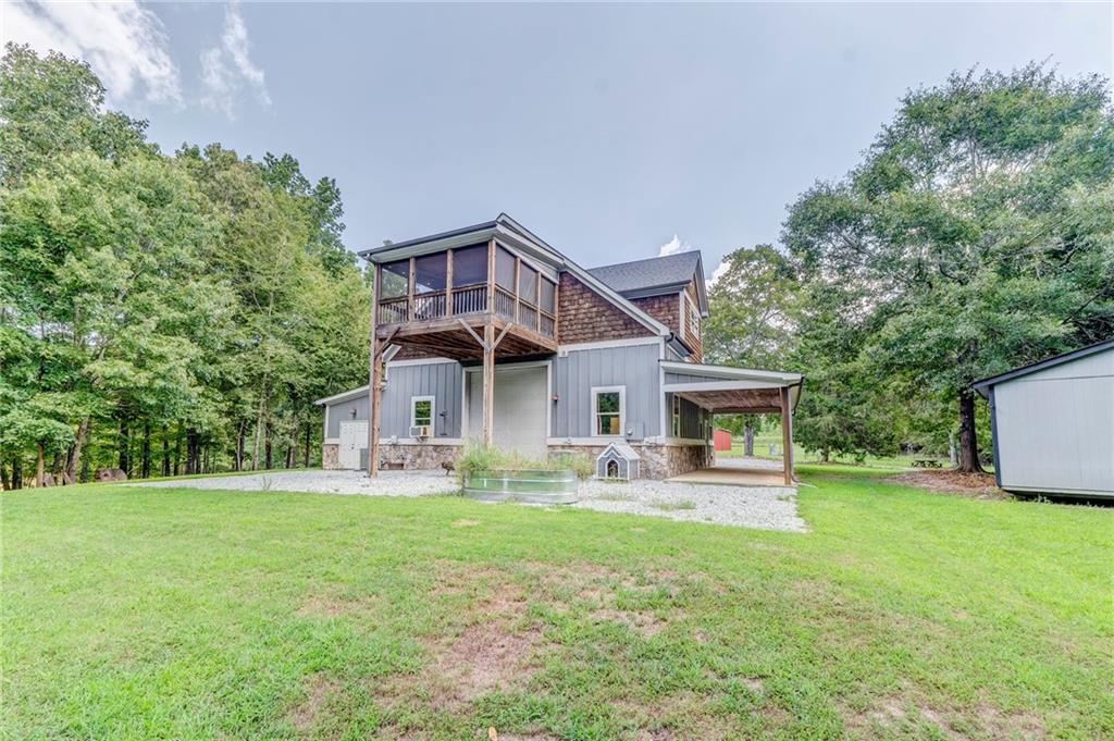 850 Bethel Church Road Southeast Silver Creek, GA 30173 - Photo 4 of 52 a front view of house with yard and green space