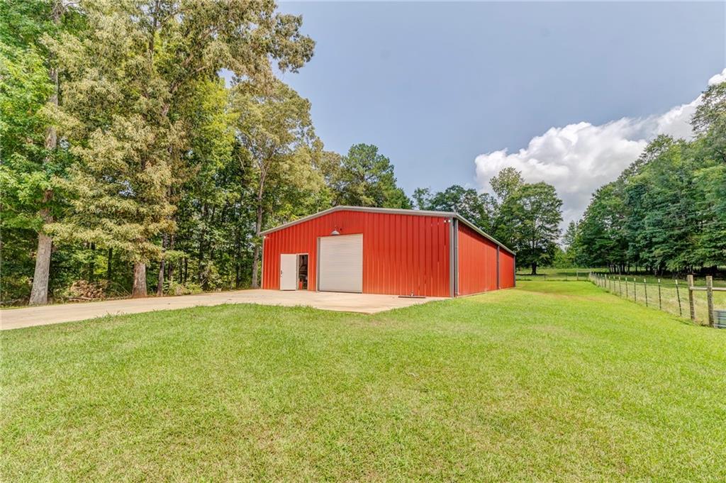 850 Bethel Church Road Southeast Silver Creek, GA 30173 - Photo 45 of 52 a big yard with large trees