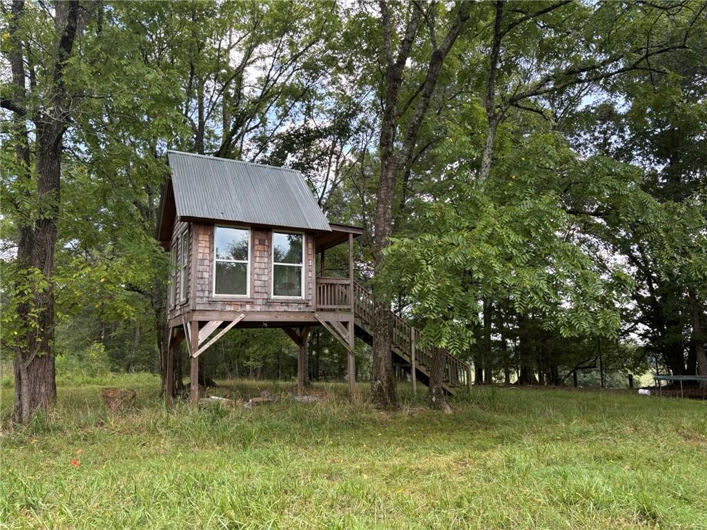 850 Bethel Church Road Southeast Silver Creek, GA 30173 - Photo 47 of 52 a front view of a house with a yard