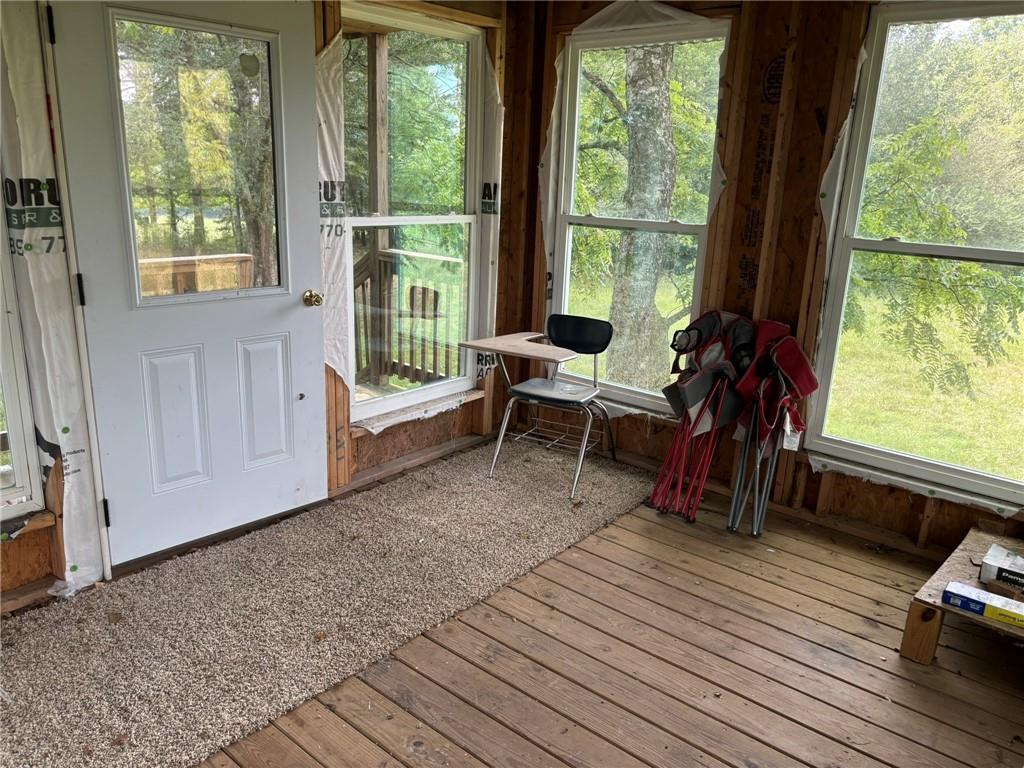 850 Bethel Church Road Southeast Silver Creek, GA 30173 - Photo 50 of 52 a living room with furniture and a wooden floor