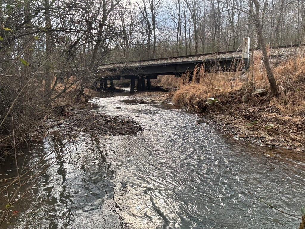 850 Bethel Church Road Southeast Silver Creek, GA 30173 - Photo 73 of 106 a view of backyard with wooden fence and large trees