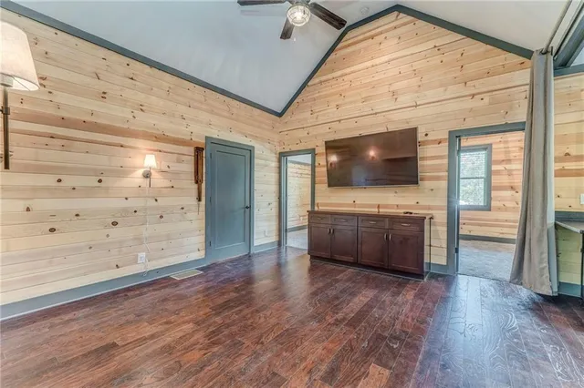 a kitchen with a refrigerator and a sink
