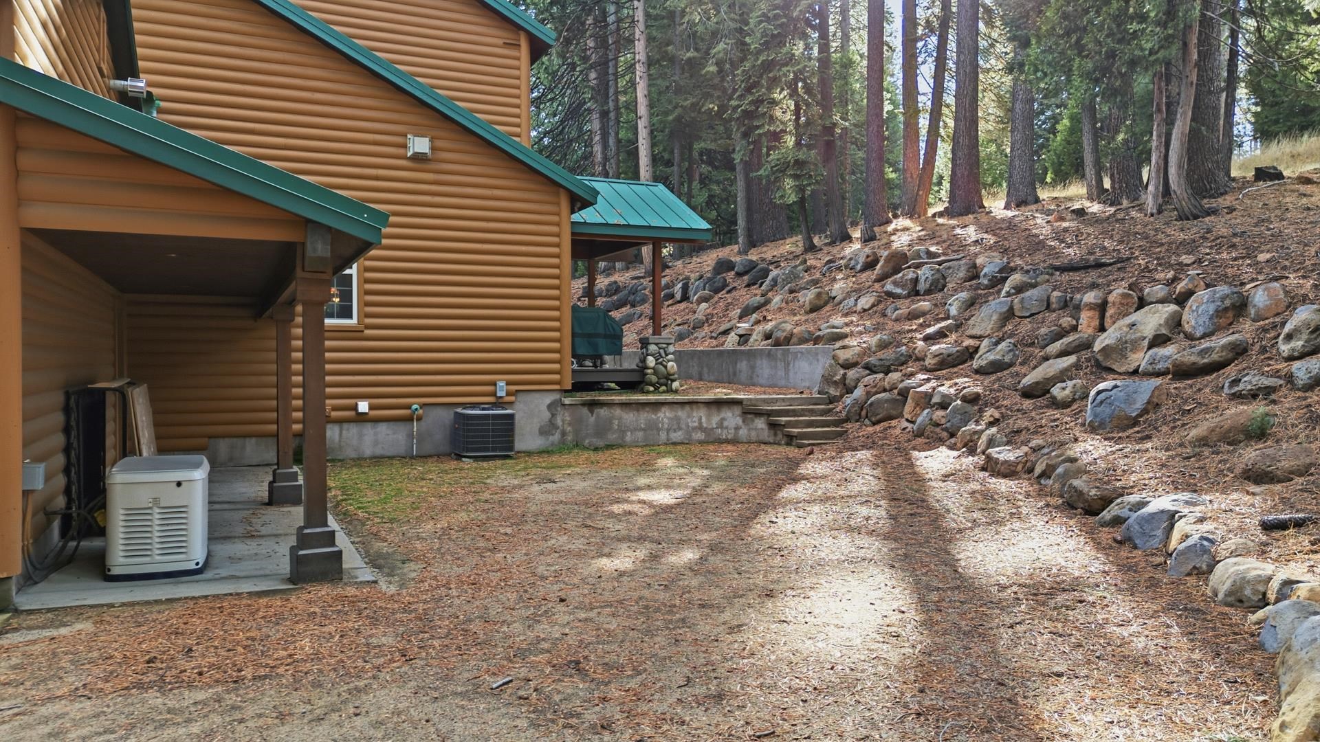 1017 Timber Ridge Road Lake Almanor, CA 96137 - Photo 45 of 45 a view of a house with a yard and tree s