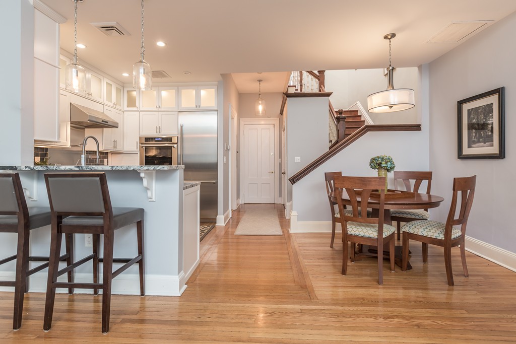 193 Beacon Street, Unit 4 Boston, MA 02116 - Photo 4 of 22 a dining room with furniture and wooden floor