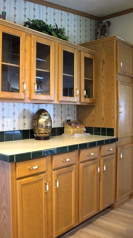 20 Deer Run Brookfield, MA 01506 - Photo 8 of 29 a kitchen with stainless steel appliances granite countertop a sink and cabinets