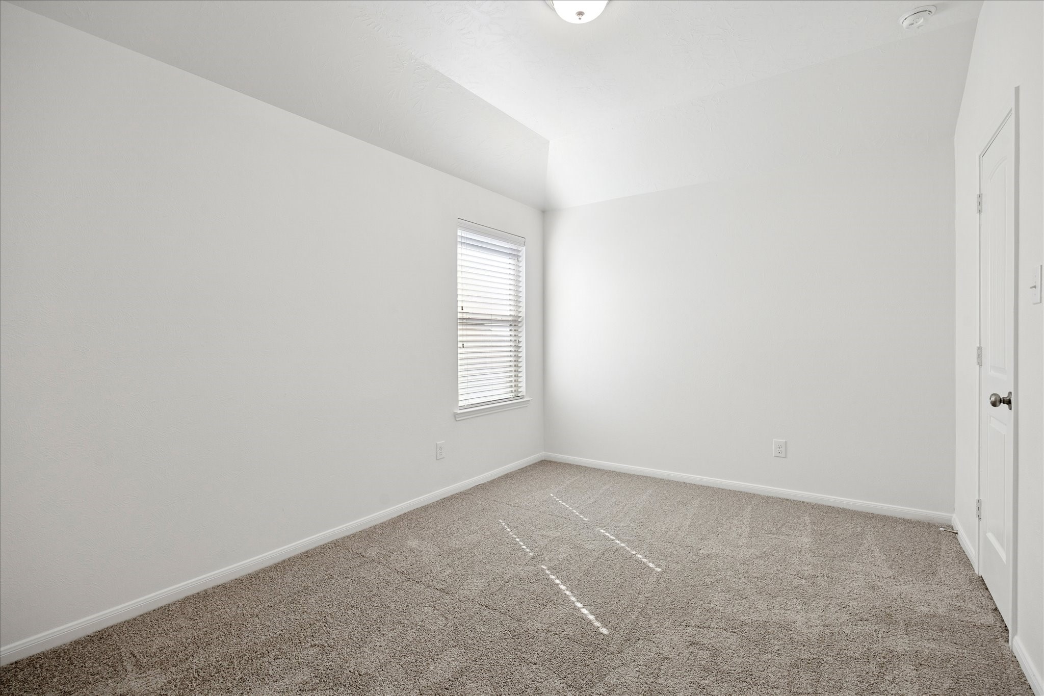 8115 Aleppo Pine Lane Cypress, TX 77433 - Photo 24 of 32 an empty room with a window