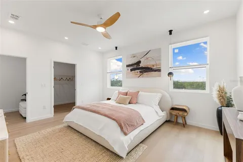 a bathroom with a tub and shower