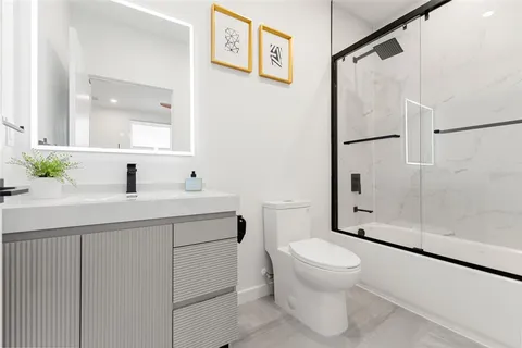 a view of a hallway with staircase