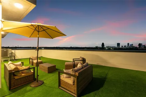 a view of a terrace with a yard