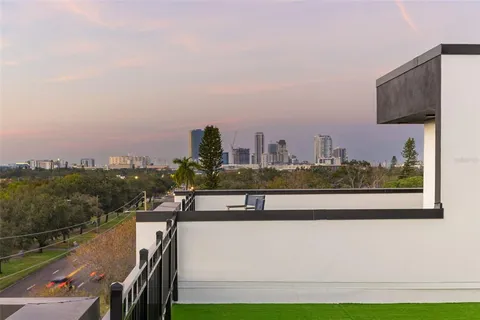 a view of a city with an ocean view