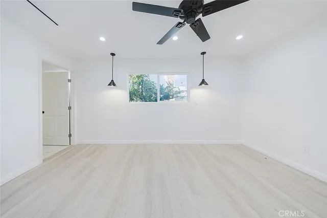 a bathroom with a shower toilet and sink