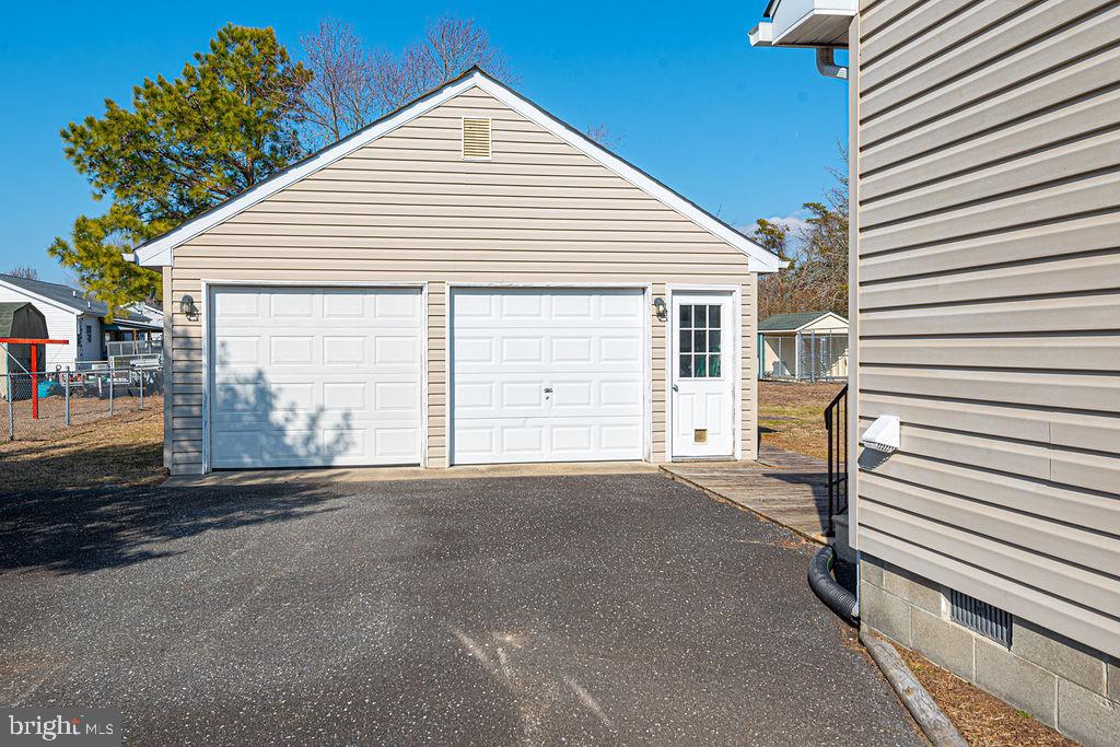 36130 Richland Road Willards, MD 21874 - Photo 2 of 42 a view of a house with a garage