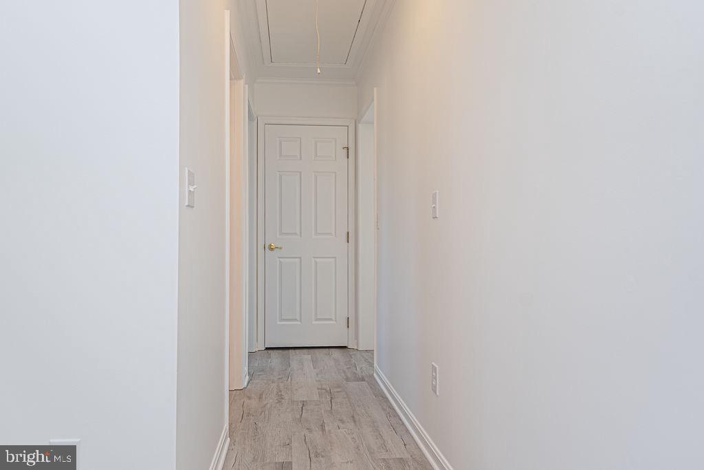 36130 Richland Road Willards, MD 21874 - Photo 21 of 42 a view of a hallway with wooden floor