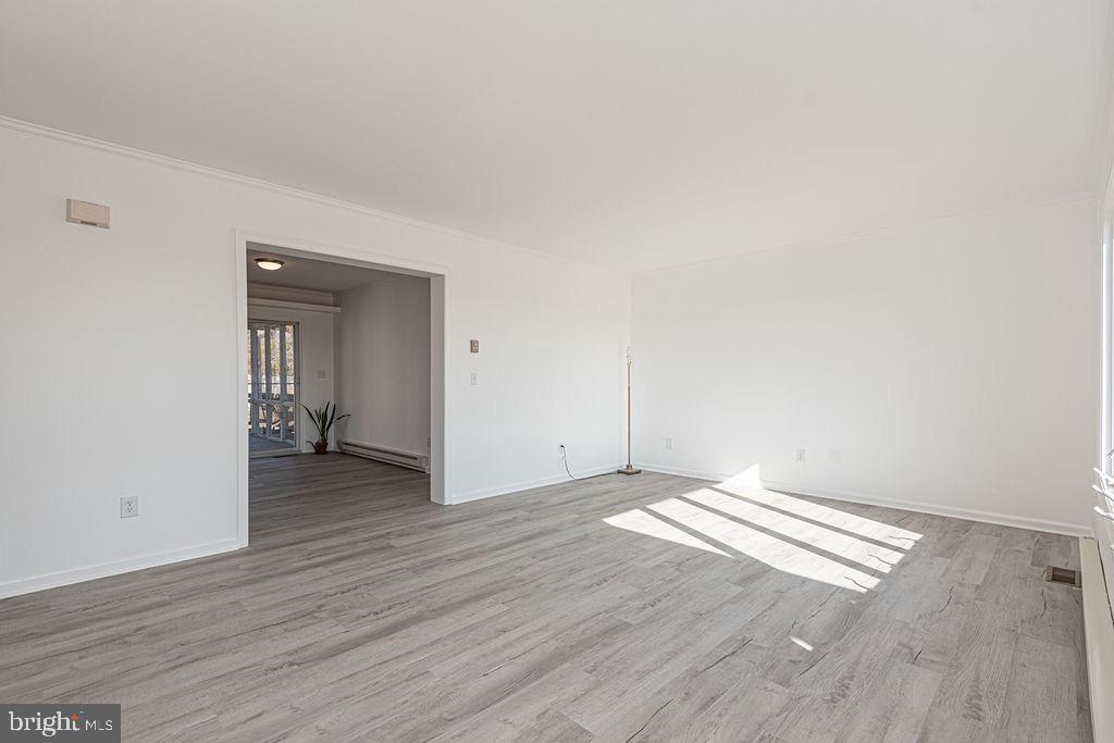 36130 Richland Road Willards, MD 21874 - Photo 4 of 42 a view of an empty room and wooden floor