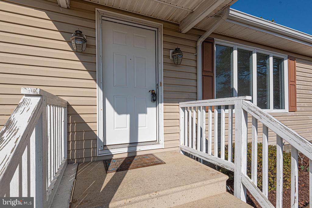 36130 Richland Road Willards, MD 21874 - Photo 42 of 42 a view of a stairs and an entrance door