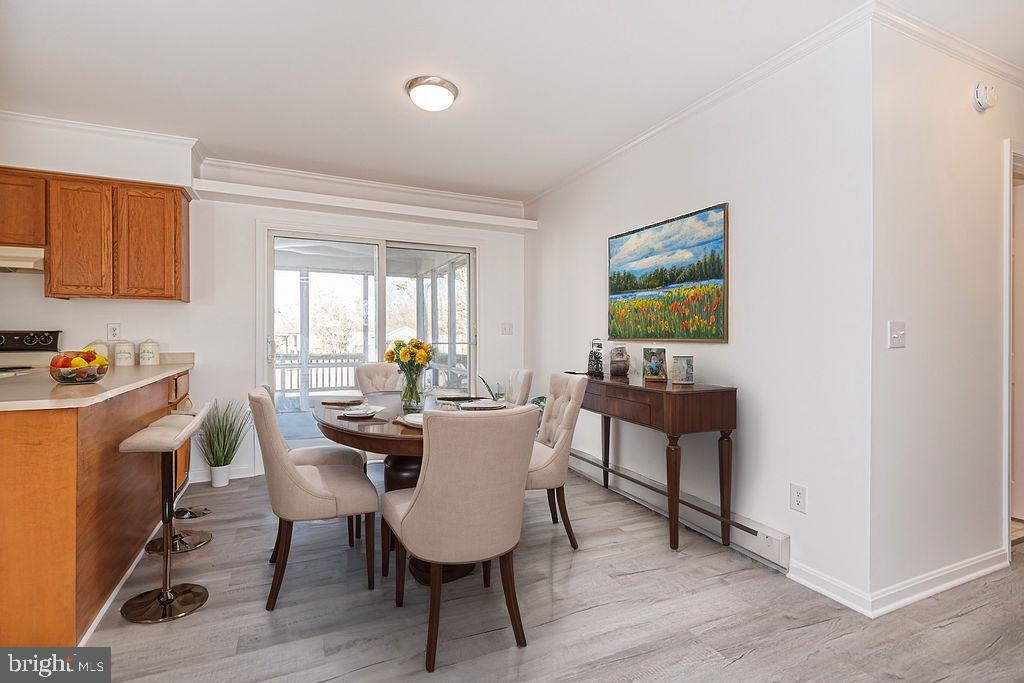 36130 Richland Road Willards, MD 21874 - Photo 7 of 42 a view of a dining room with furniture window and wooden floor