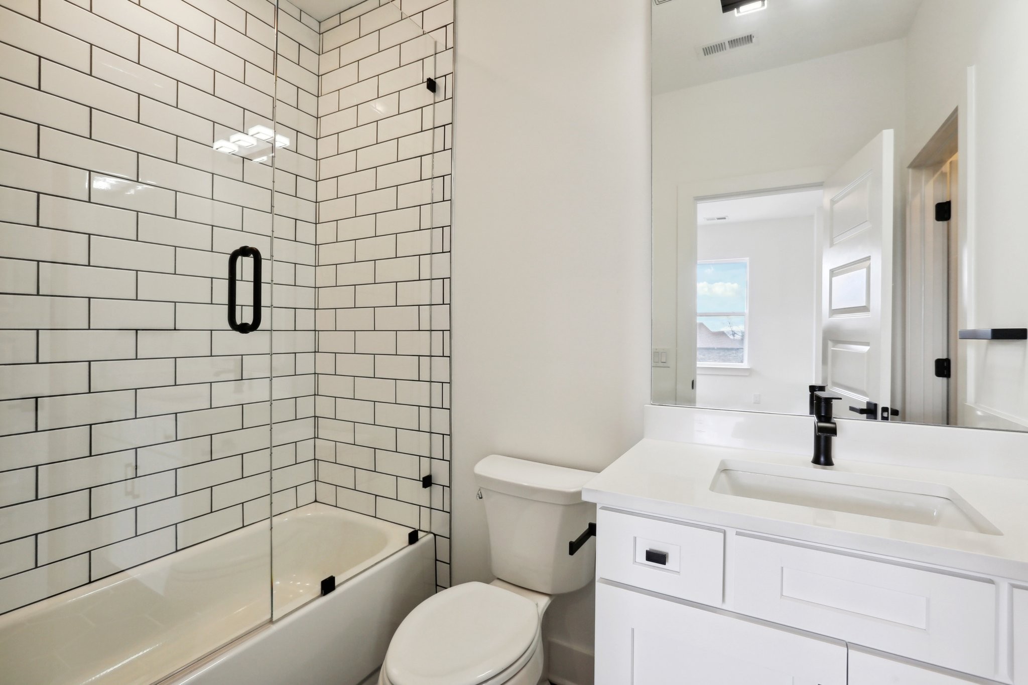 6100 Lookaway Circle Franklin, TN 37067 - Photo 33 of 92 a bathroom with a bathtub shower sink mirror and toilet
