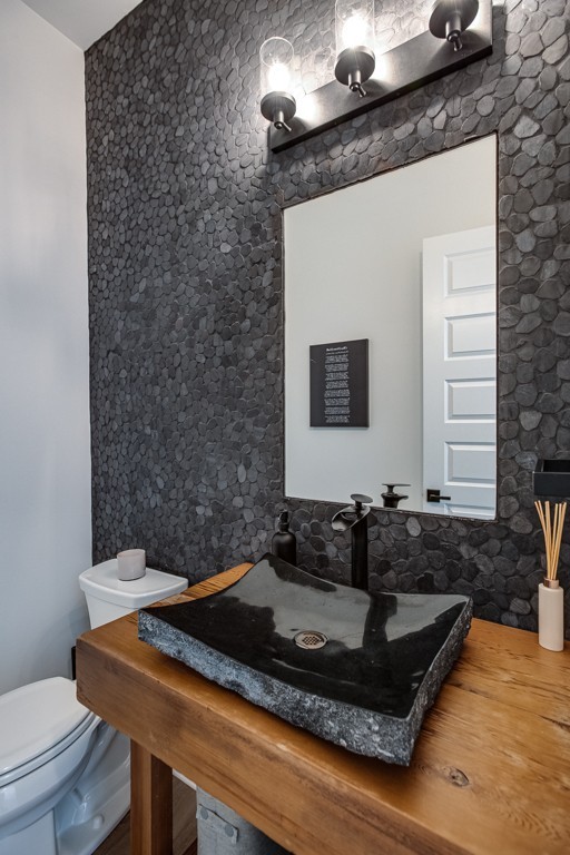 6100 Lookaway Circle Franklin, TN 37067 - Photo 55 of 92 a bathroom with a granite countertop sink a toilet and mirror