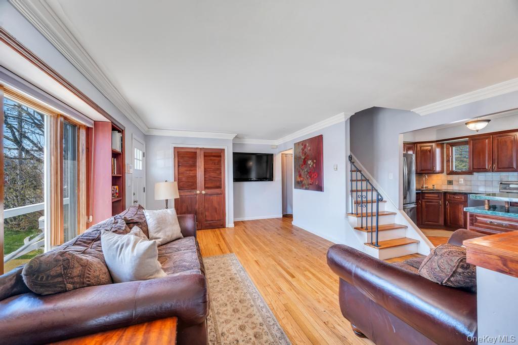 398 33rd Street Lindenhurst, NY 11757 - Photo 13 of 44 a living room with furniture and large windows