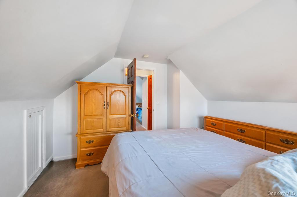 398 33rd Street Lindenhurst, NY 11757 - Photo 33 of 44 a bed room with a bed and window