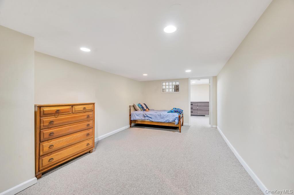398 33rd Street Lindenhurst, NY 11757 - Photo 36 of 44 a view of room with toys and wooden floor
