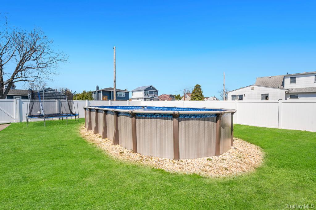 398 33rd Street Lindenhurst, NY 11757 - Photo 8 of 44 a view of a house with backyard and deck