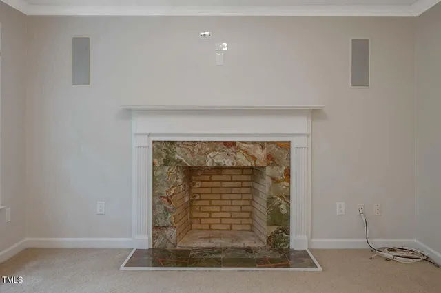 a bathroom with a sink a window and a shower
