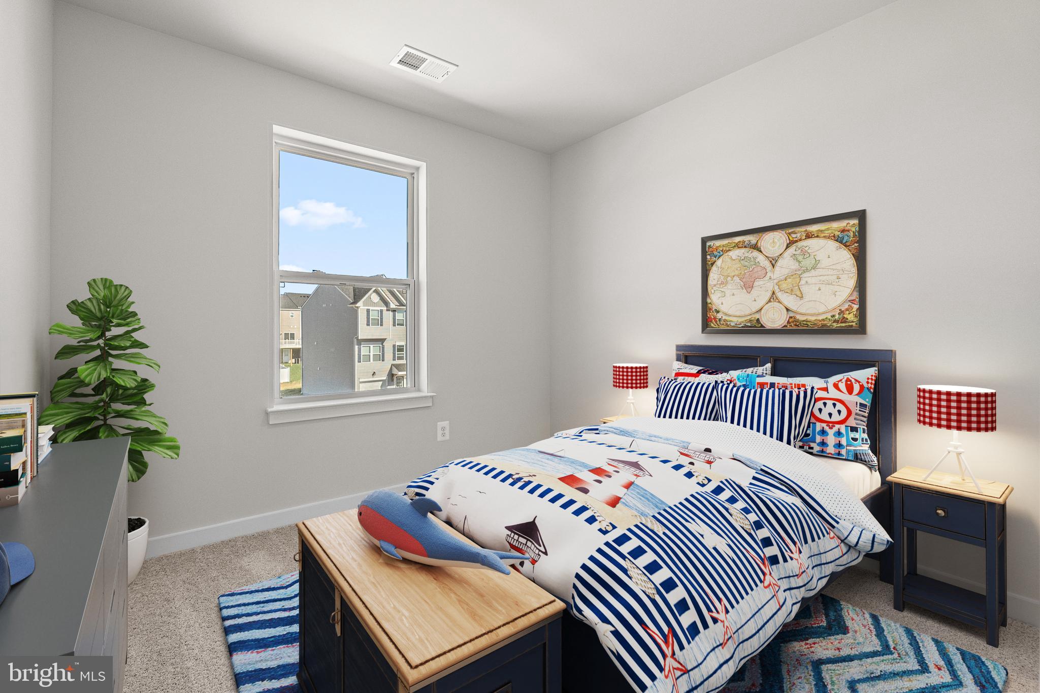 1985 Huntwell W Avenue Ranson, WV 25438 - Photo 14 of 20 a bedroom with a bed and a potted plant