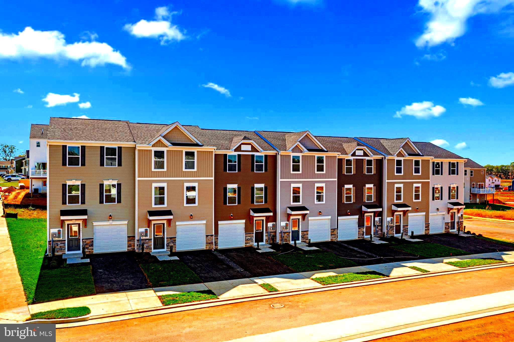 1985 Huntwell W Avenue Ranson, WV 25438 - Photo 2 of 20 a front view of a building with cars parked