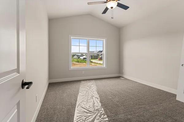 a bathroom with double sink and a mirror