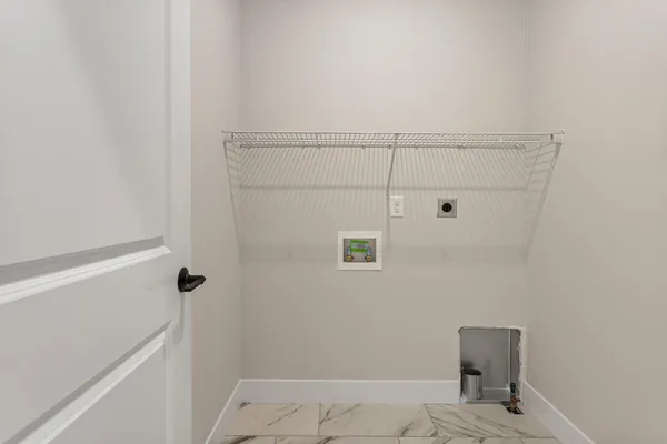 a view of a room with wooden walls