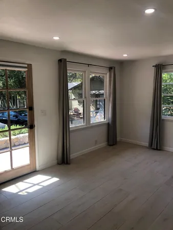 a kitchen with stainless steel appliances a sink and a stove top oven