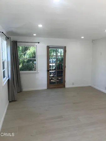 a kitchen with a sink and a window